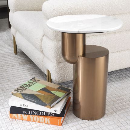A brushed brass and white marble side table