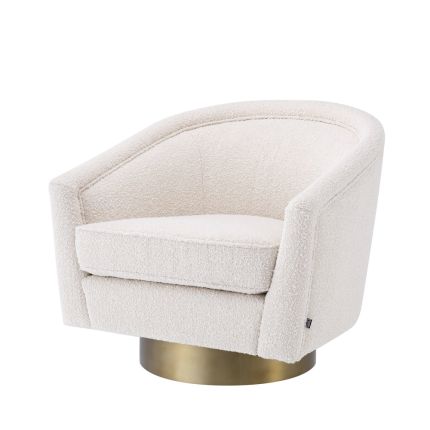 cream coloured boucle swivel chair with matte golden base 