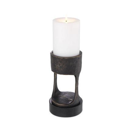 A vintage style bronze candle holder with a granite base