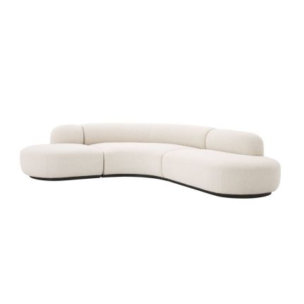 An exquisite, contemporary curved sofa with boucle upholstery