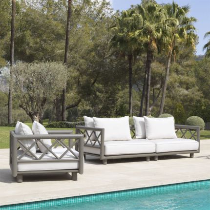 Luxury modern outdoor sofa in a greige finish with neutral linen seating by Eichholtz