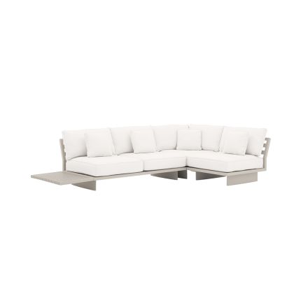 A luxurious outdoor sofa by Eichholtz with a sunbrella canvas and sand finish