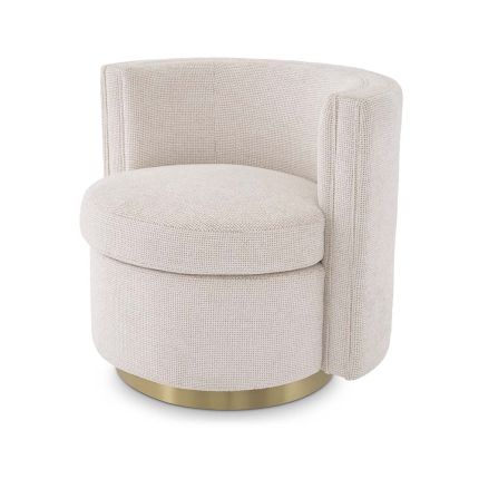 A beautifully curved, swivel chair in a gorgeous off-white fabric.