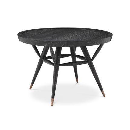 A stylish side table from Eichholtz with a wooden structure, charcoal grey veneer finish and tapered legs with antique brass capped feet