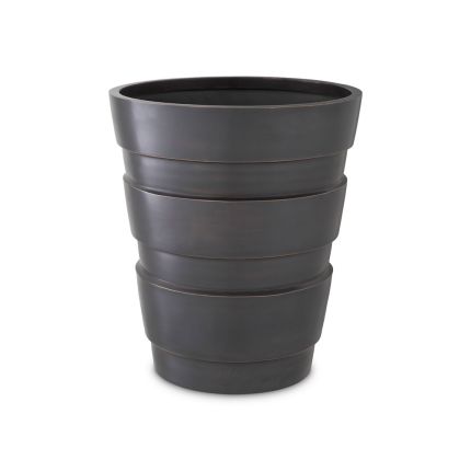 A stylish planter by Eichholtz with a modern design and antique bronze finish