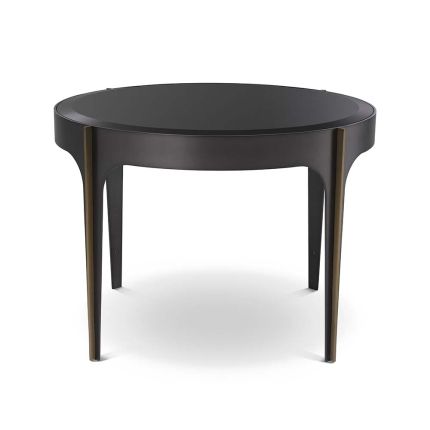 A gorgeous dark side table with a bevelled glass top with bronze and brass elements