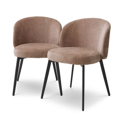 A stylish set of dining chairs from Eichholtz with a dusty pink fabric upholstery 
