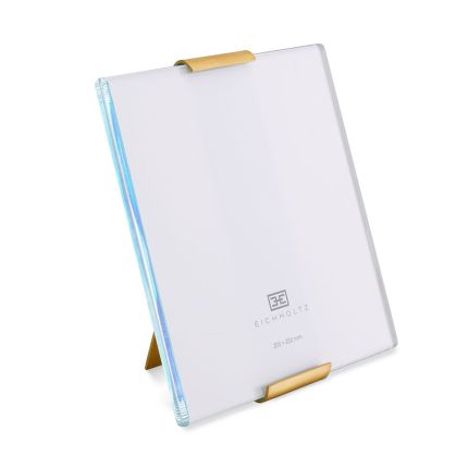 A glamorous, square picture frame by Eichholtz with brass detailing and a clear glass finish