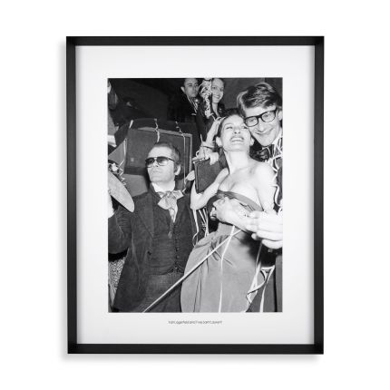 A print by Eichholtz which depicts an iconic photograph of Lagerfeld and Yves Saint Laurent at the wedding of Paloma Picasso and Rafael Lopez Sanchez