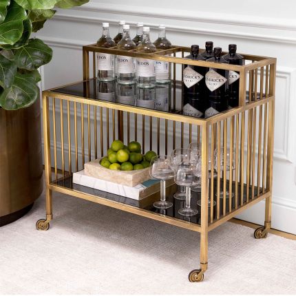 Glamorous, art-deco inspired drinks trolley with brass frame and black glass