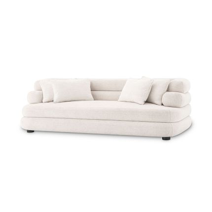 A contemporary and curvaceous sofa by Eichholtz with a luxury Lyssa Off-White upholstery