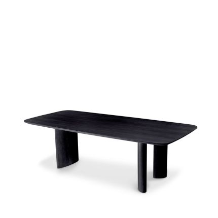 A luxury black veneer dining table by Eichholtz with offset playful table legs
