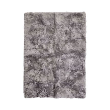 Small light grey sumptuously soft sheepskin rug
