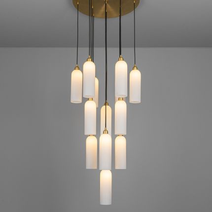 A luxurious chandelier by Schwung with translucent opal glass lampshades and a solid brass structure