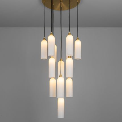 A luxurious chandelier by Schwung with translucent opal glass lampshades and a solid brass structure