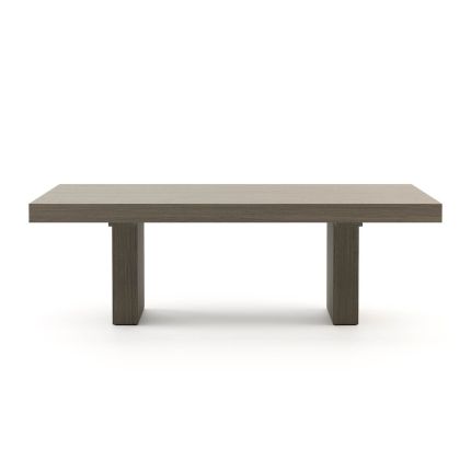 A luxurious minimal dining table in a grey eucalyptus finish