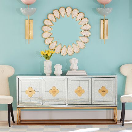 A luxurious mother of pearl mirror with a brass structure 