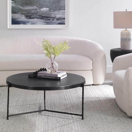 Sleek contemporary round coffee table in black finish