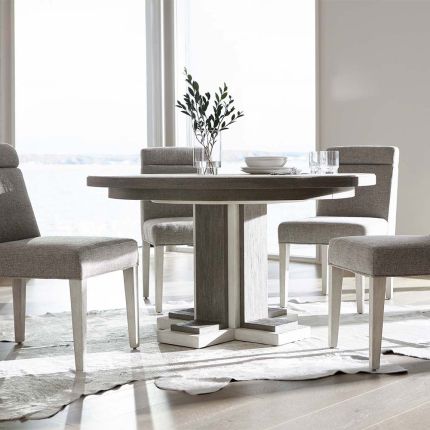 Circular dining table with two toned wood
