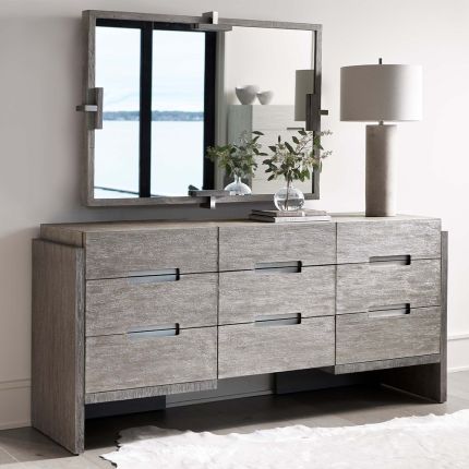 A gorgeous grey, two toned dresser from Bernhardt with nine soft closing drawers and stainless steel hardware