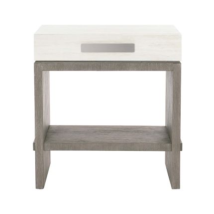 A gorgeous bedside table from Bernhardt featuring a two tone finish, soft closing drawer box, base shelf and dual port
