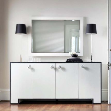 Monochromatic sideboard with four doors and rose detail handles