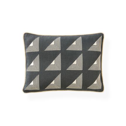 A modern linen cushion with a stylish, geometric matrix triangle design and corded edge 