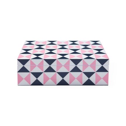 A colourful and graphic box with a 60s inspired pattern 