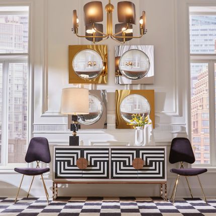 Modernist inspired poppy sideboard with brass accents and black and white pattern