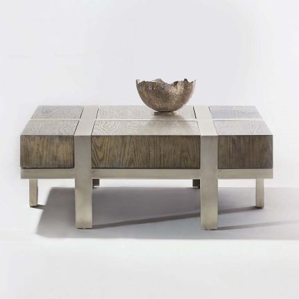 An industrial and scandinavian inspired coffee table with steel panel details.