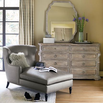 A classic and timeless dresser featuring a natural white oak veneer finish and eight spacious drawers