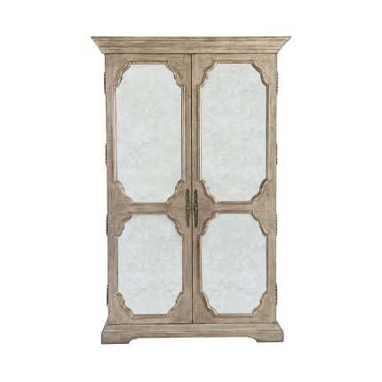 A beautiful armoire by Bernhardt featuring two wood-framed doors with antique mirrored glass panels