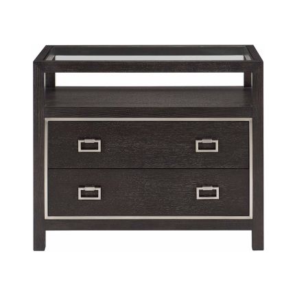 A stunning glass-topped bedside table by Bernhardt.