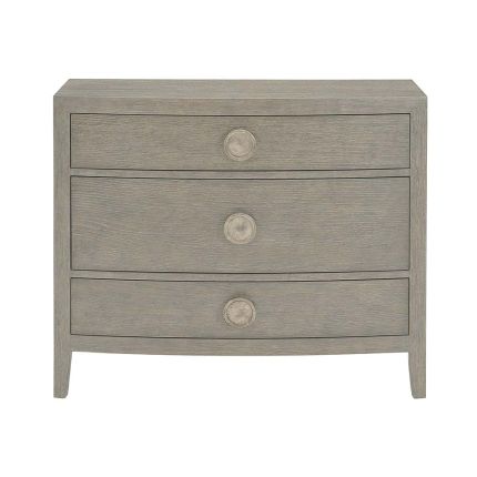 A luxurious greige bedside table by Bernhardt.