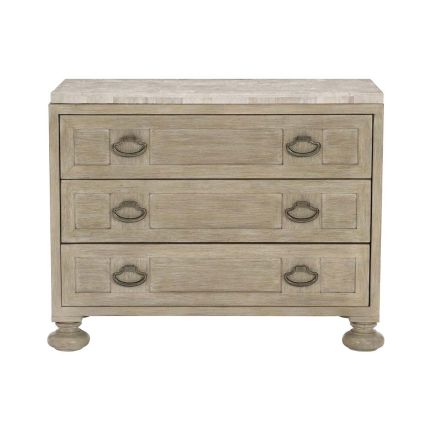 A rustic bedside table with a stone top.