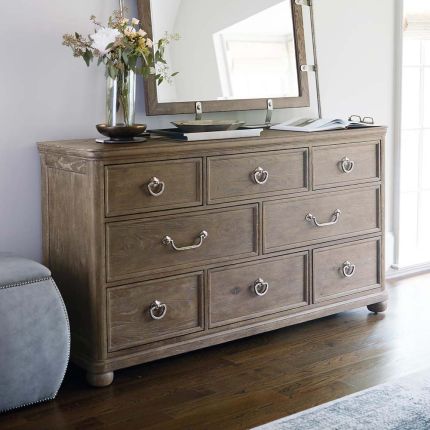 Subtle 8-drawer dresser in a light, natural wood finish