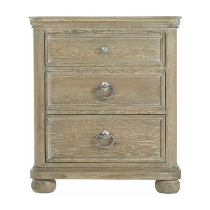 rustic bedside table in sand.