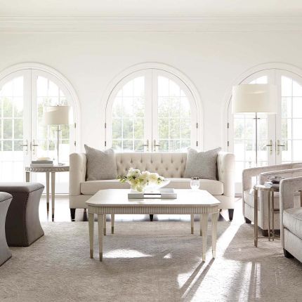 An eight-legged coffee table in a light natural finish