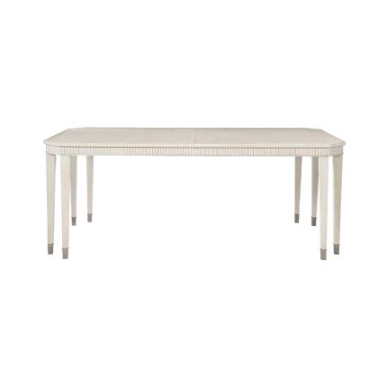 A luxury extendable dining table with 8 legs and capped feet