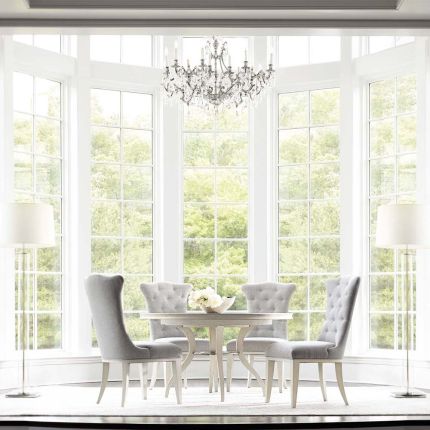pale, circular dining table