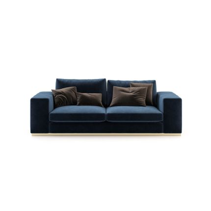 Blue velvet 2 seater sofa with wide arms and golden detailing. Pictured in Vienna Deep Blue.