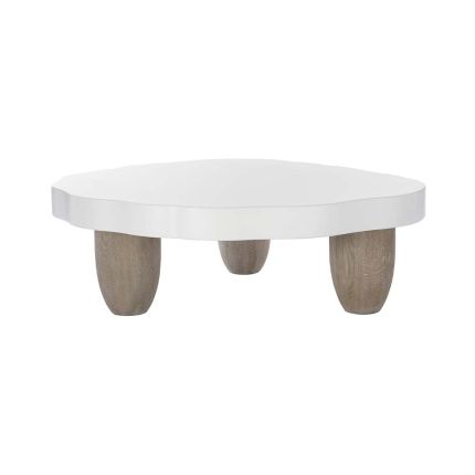 An alternative coffee table with an irregular shaped base and contrasting feet.