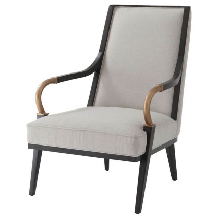 Grey armchair with brass accents, black legs and frame