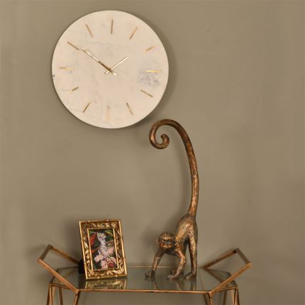 Brass inlay and white marble wall clock