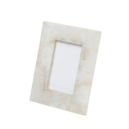 A stylish small white quartz picture frame