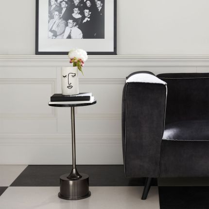 A chic green marble and metallic black nickel side table
