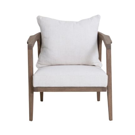 A luxurious mindi wood chair with off-white upholstery and a rattan backrest