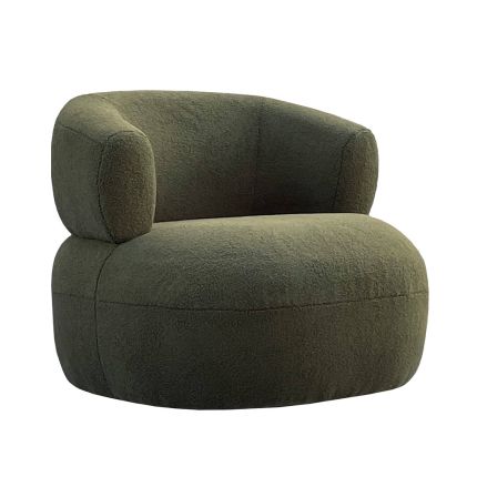 A luxurious, plush armchair with boucle upholstery