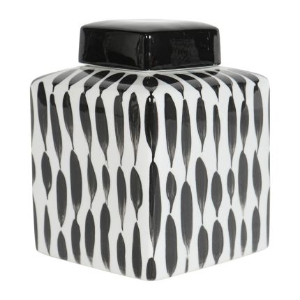 delicately painted jar with black patterned streaks. 