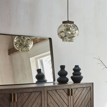 A contemporary vase with an abstract wavy design and a powder black finish 